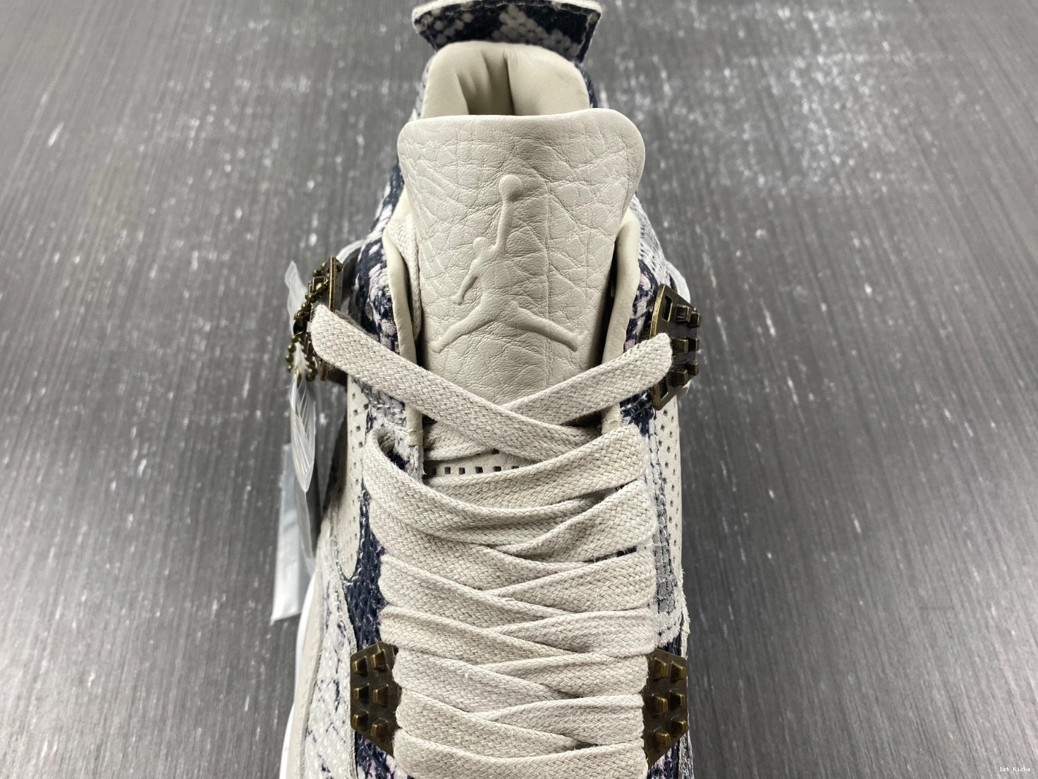 - 819139-030 Retro Snakeskin Jordan 4 1225